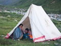 yak man and tent in Tsurphu trek
