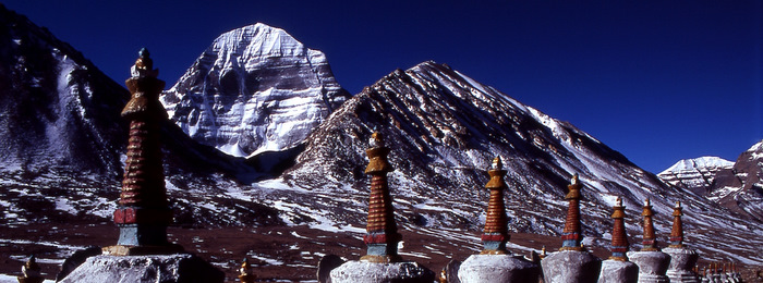 White stupas in front of Mt. Kailash