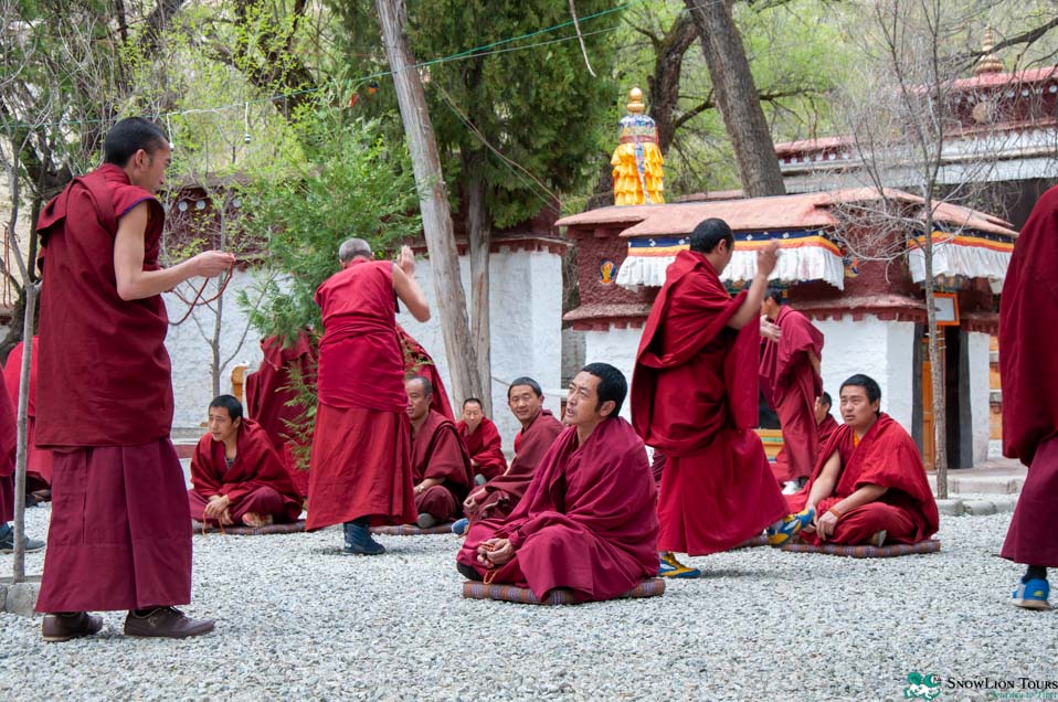 watch Tibetan monks debate in Sera Monastery in Lhasa on the way to Mount Everest Tour