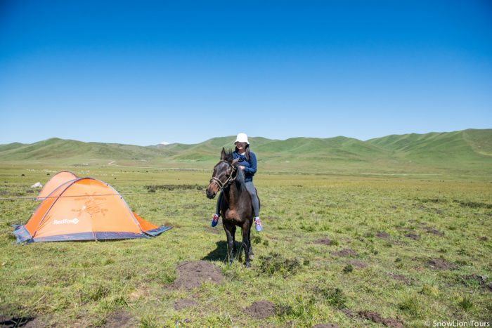 Riding horse at camping sites in Amdo Tibet
